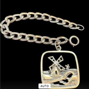Vintage Napier Sterling Silver Mechanical Windmill Charm Bracelet – c. 1946–1954